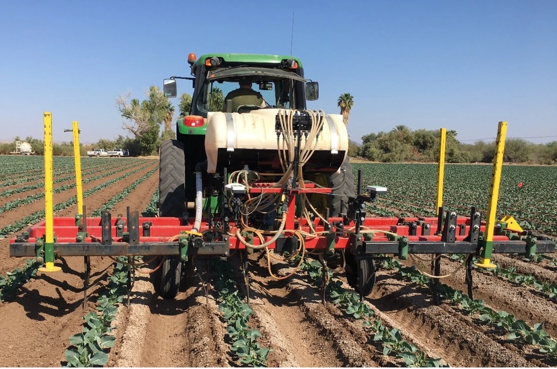Figure 3-2-2. Side dress N fertilizer application in a cauliflower field near Yuma